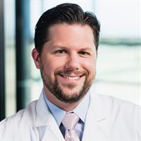portrait of Thomas B Roshek, MD